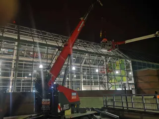 Replacing atrium glass