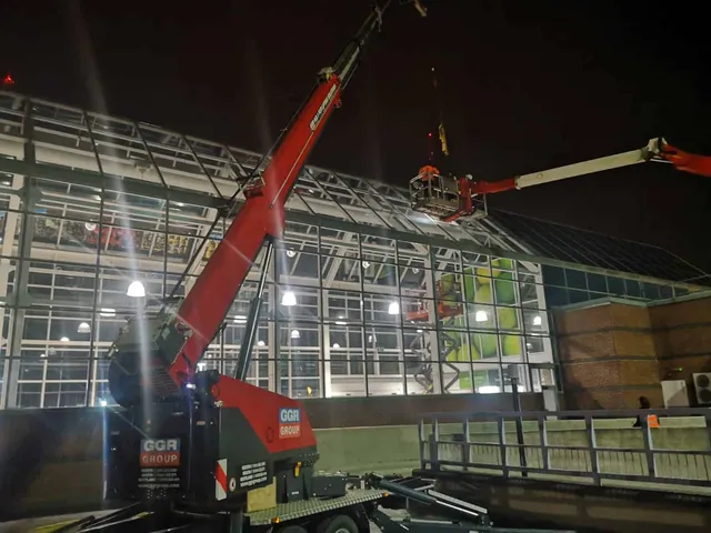 Using a crane to replace atrium glass