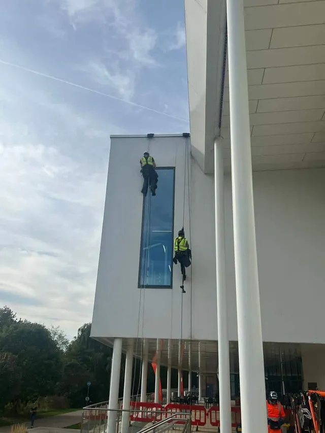 Using ropes to work on commercial glazing