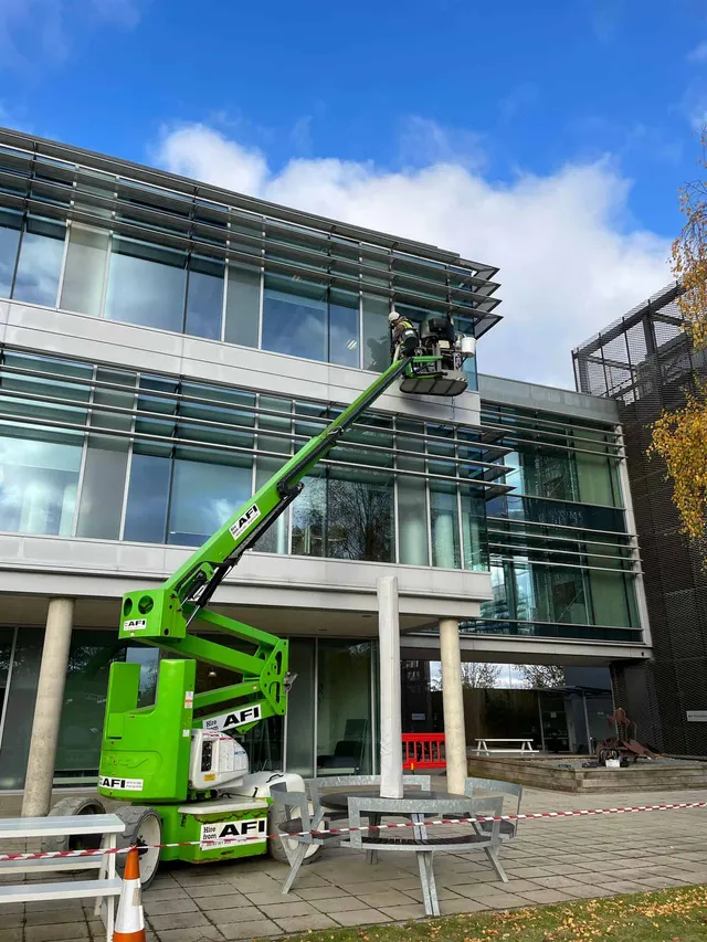 Fixing glass leak with cherry picker