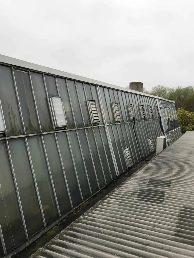 Glass curtain that needs refurbishment