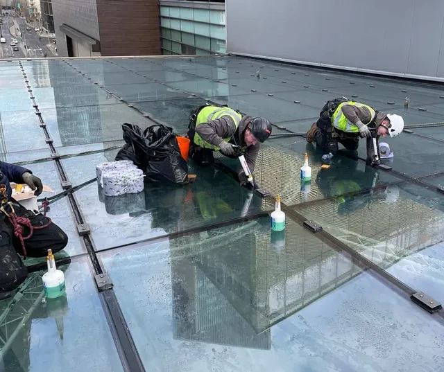Repairing a high glass roof