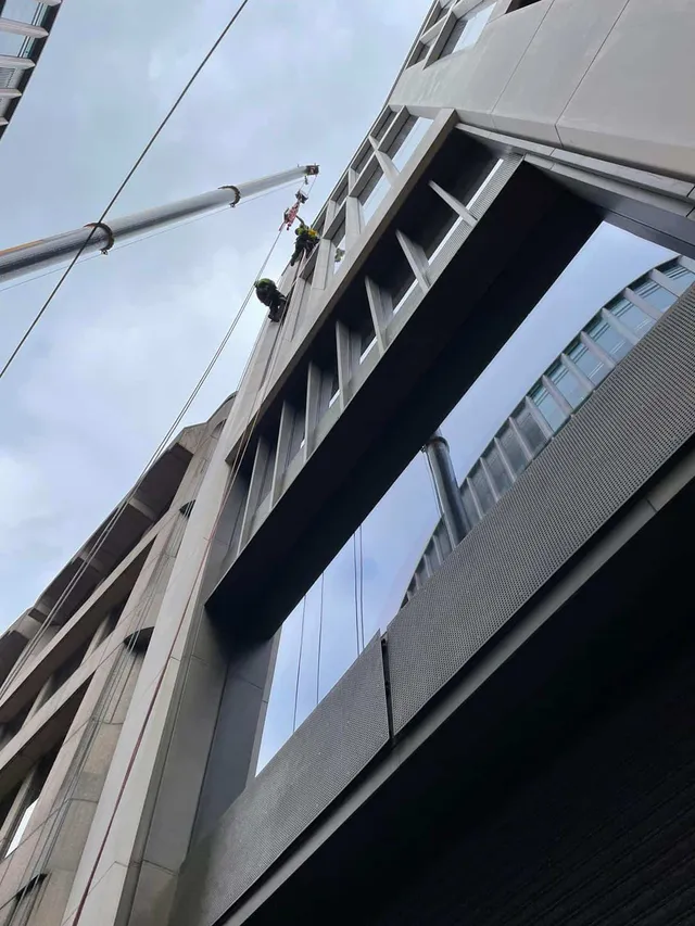 Replacing high-level glass with a crane