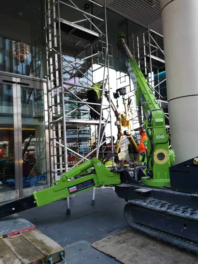 Using machines to replace oversized glass