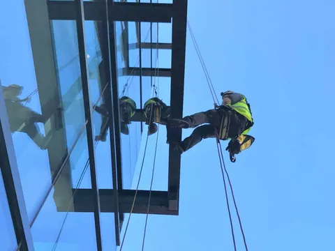 Rope access for glass maintenance